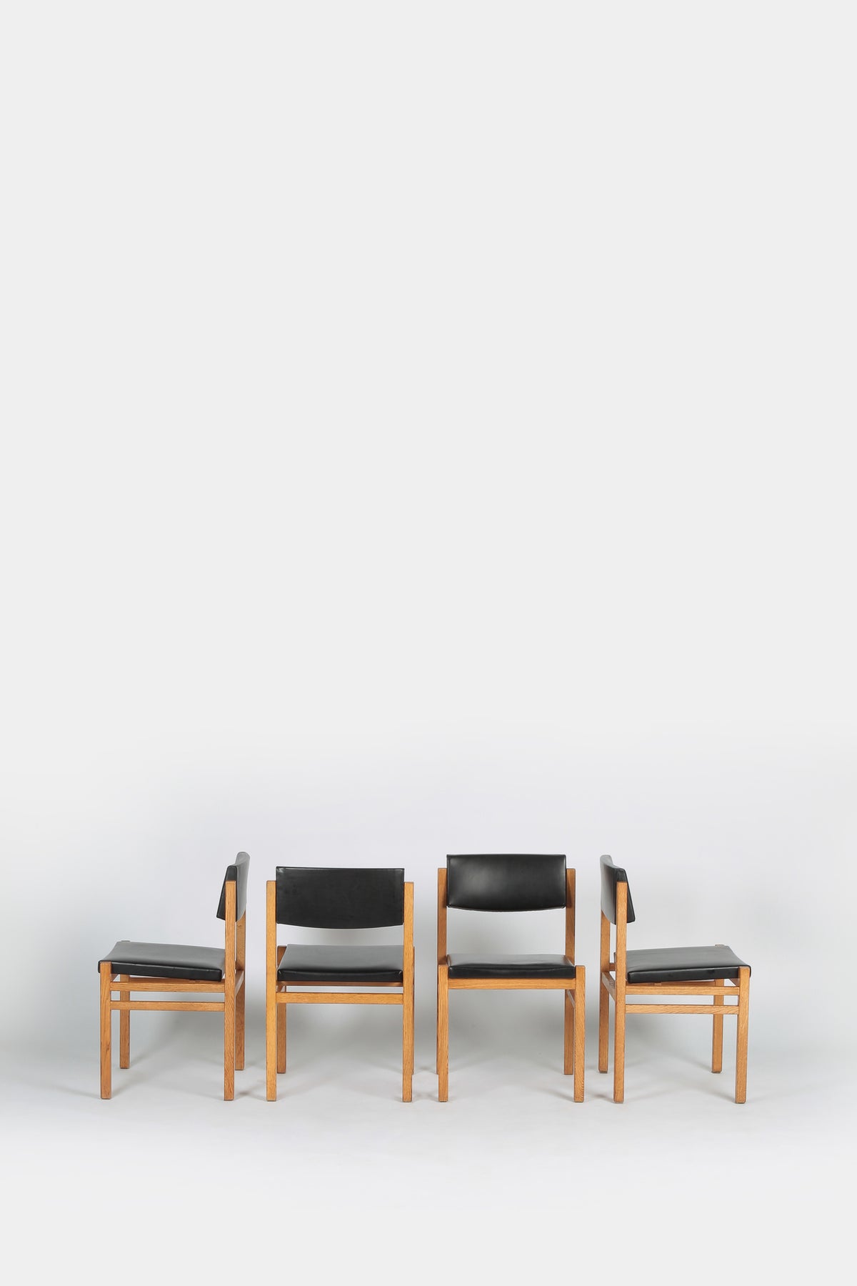 Set with 4 Hermann Baur chairs, oak and leather 60s