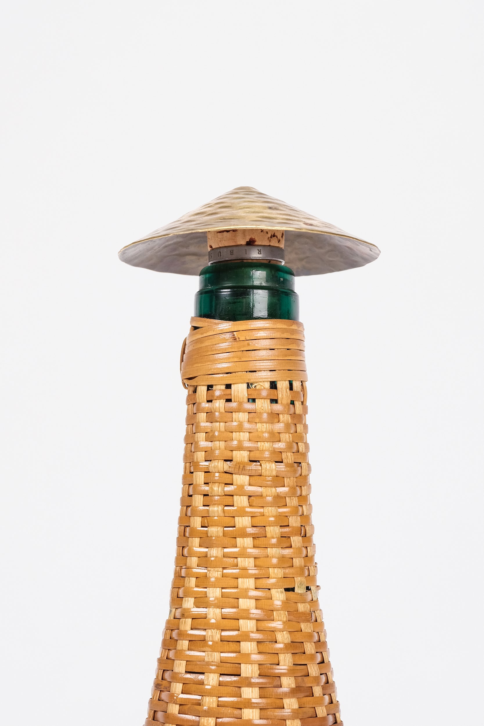 Weave-covered bottle, France, 50s
