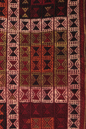Belutschenteppich mit geometrischem Muster, geknüpft und gewoben