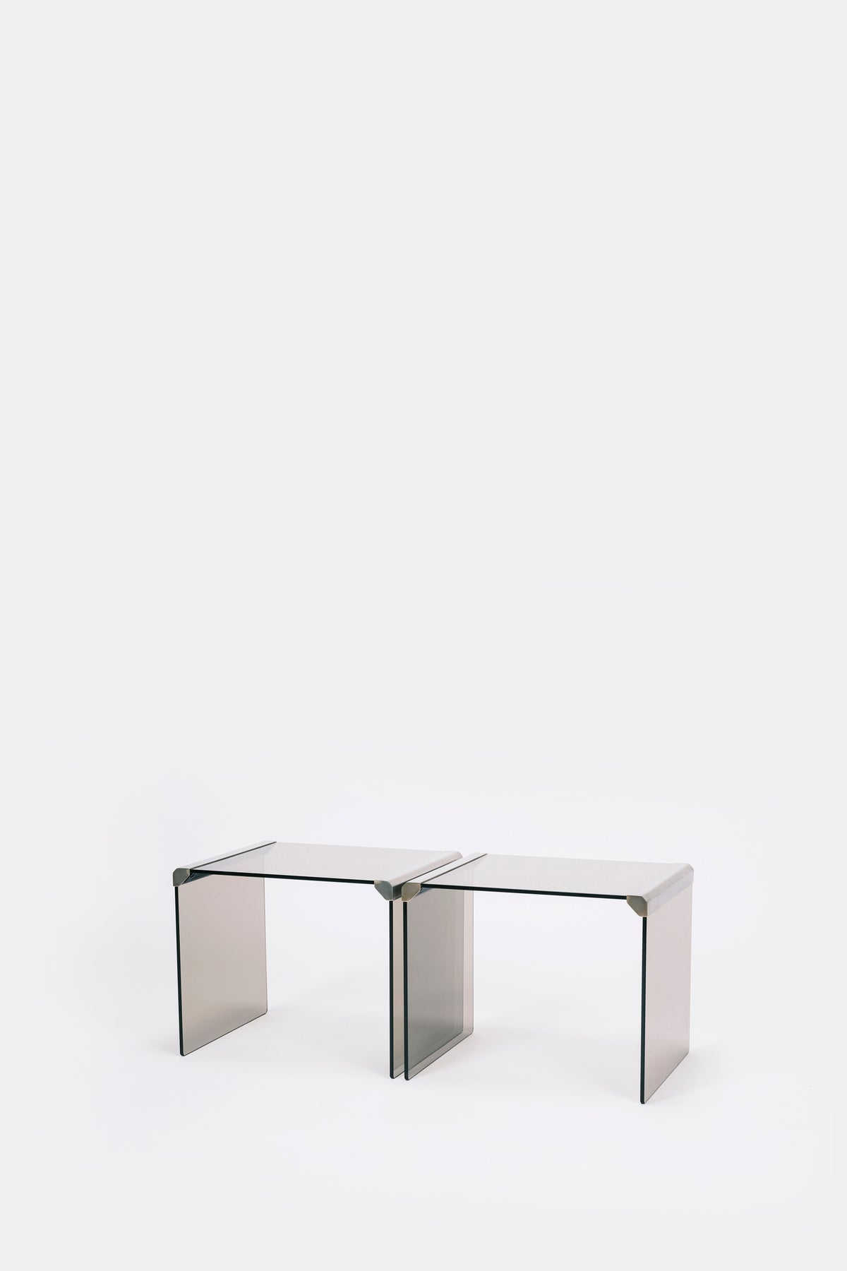 Pair of glass tables Pierangelo Galotti 70s
